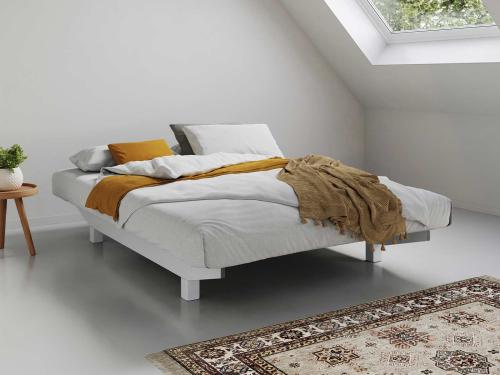 white wooden floating platform bed frame without headboard space saver design