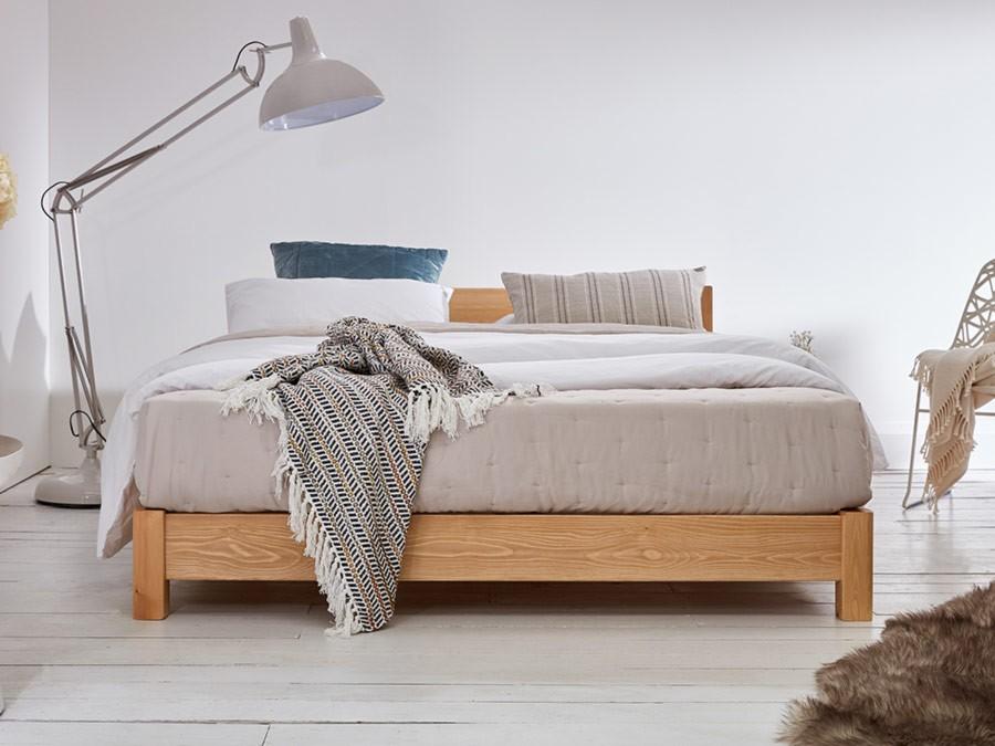 low oriental wooden bed frame front view